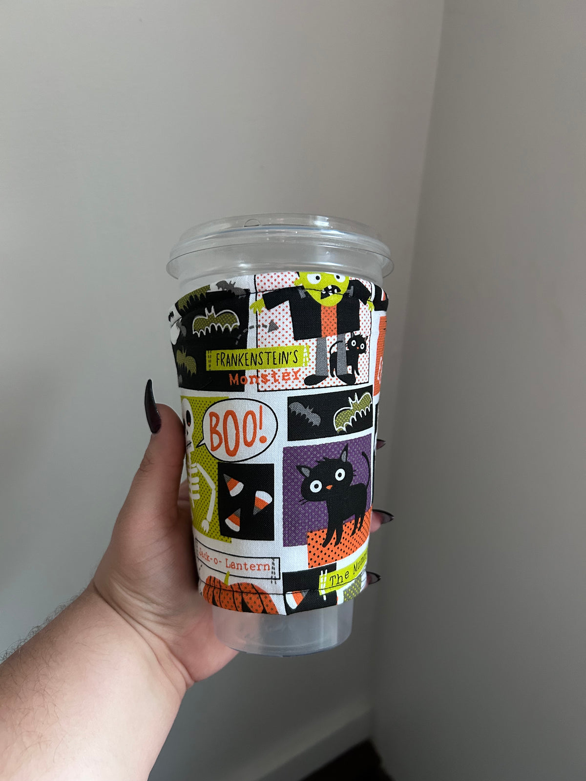 Haunted Headlines Coffee Cozie