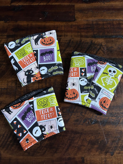 Haunted Headlines Coffee Cozie