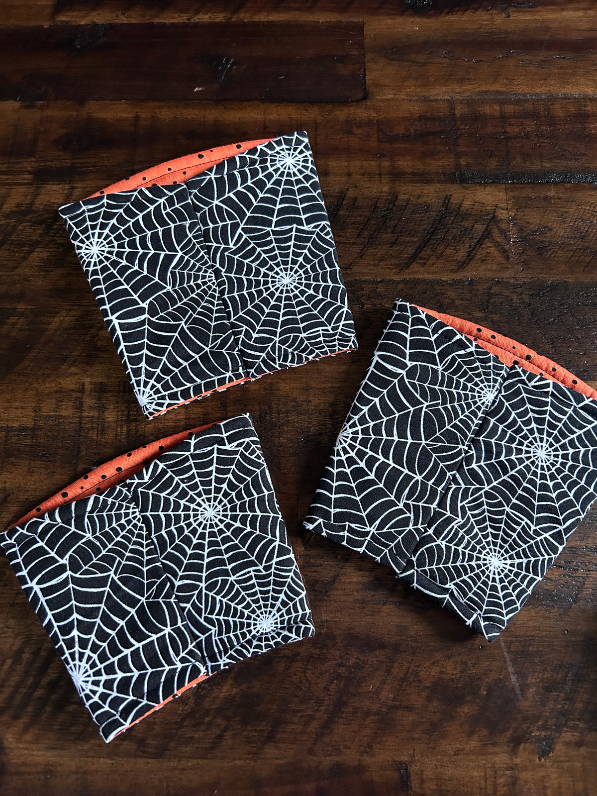 Web of Lies Coffee Cozie